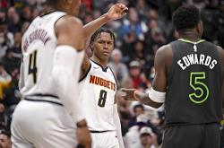 三亿体育体育中国官网-太阳惜败掘金，约基奇砍下27+11